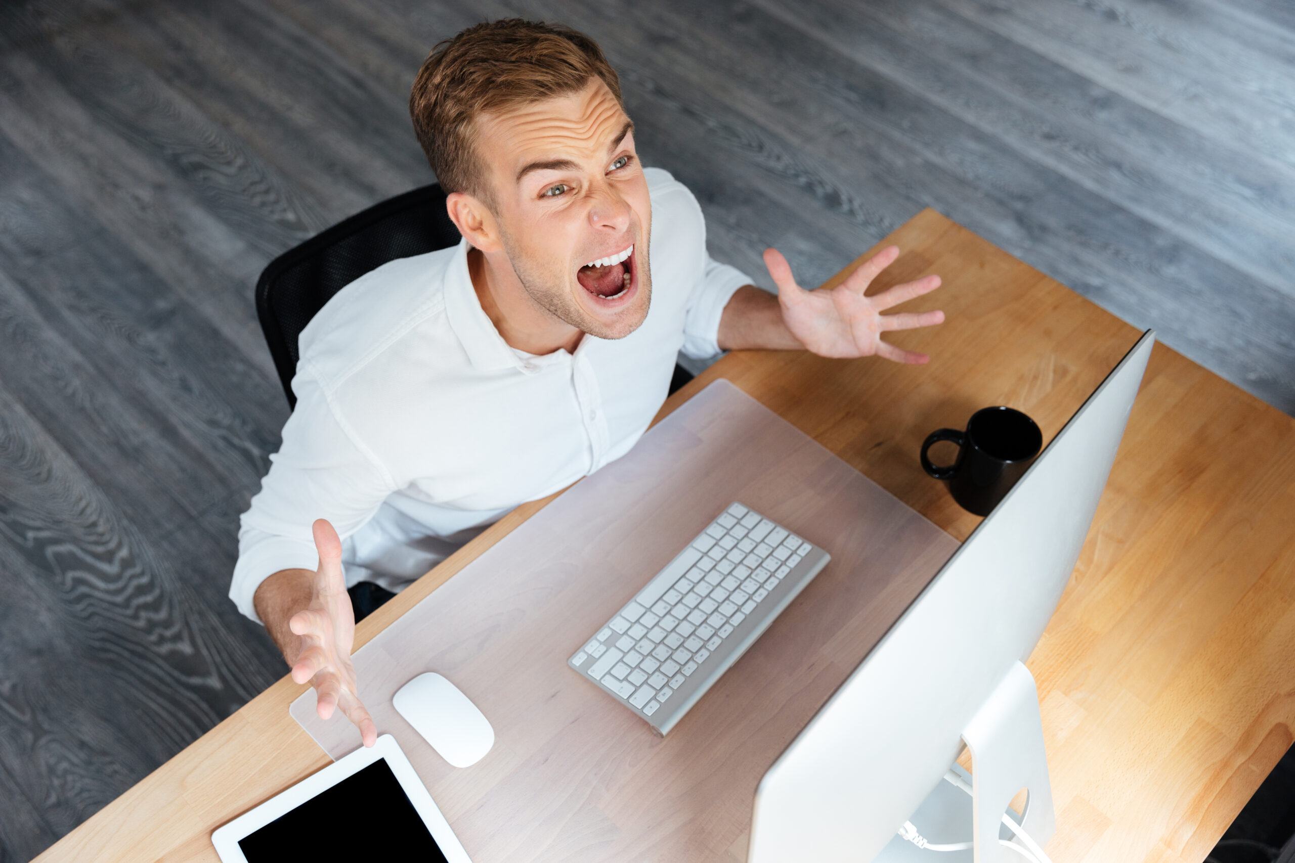 graphicstock-top-view-of-mad-young-businessman-working-with-computer-and-shouting_BdWx2ofB2e-scaled Ditch the Diet Mentality: 5 Realistic Ways to Achieve Long-Term Weight Loss